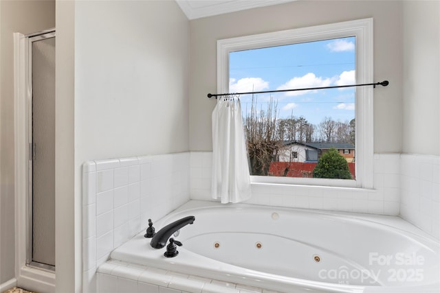 bathroom featuring independent shower and bath