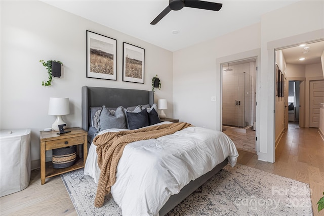 bedroom with light hardwood / wood-style flooring and ceiling fan