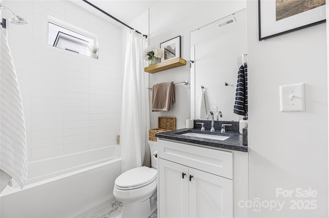 full bathroom featuring shower / bathtub combination with curtain, vanity, and toilet