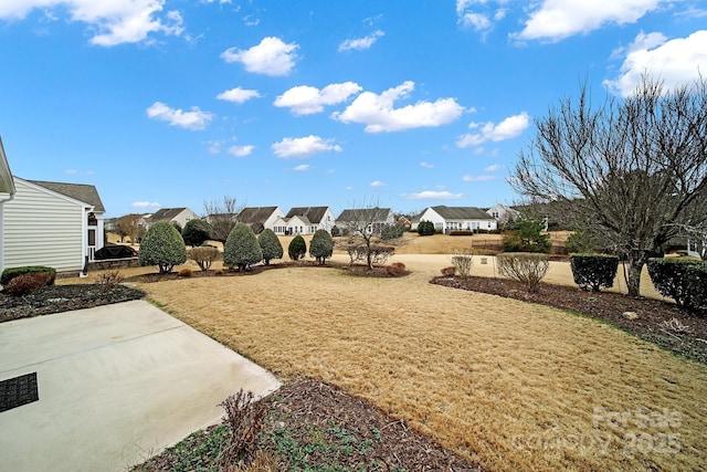 view of yard featuring a residential view