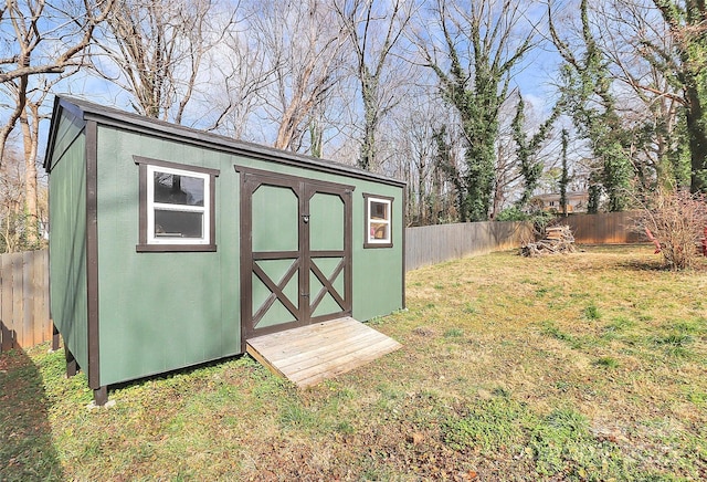 view of outdoor structure featuring a yard