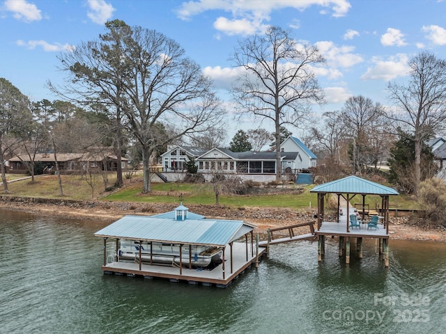 view of dock featuring a water view and a gazebo