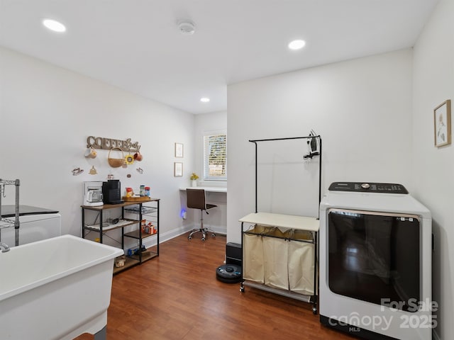 interior space featuring baseboards, wood finished floors, and recessed lighting