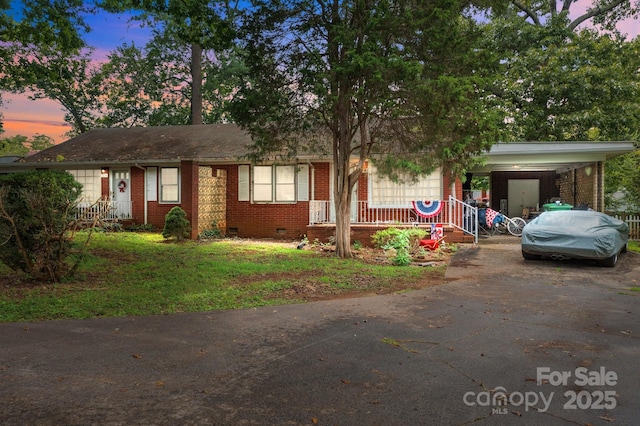 view of front of house featuring a carport