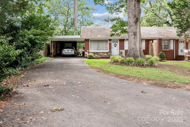 ranch-style home with a carport