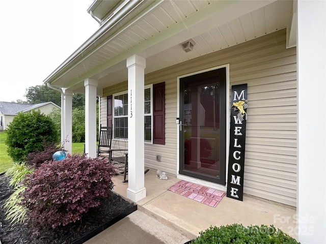 property entrance with a porch