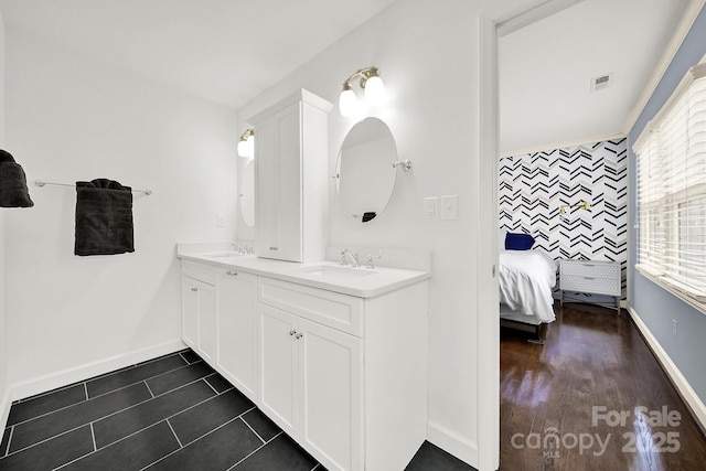 bathroom featuring vanity and tile patterned flooring