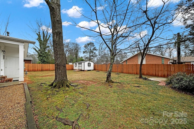 view of yard with a storage unit