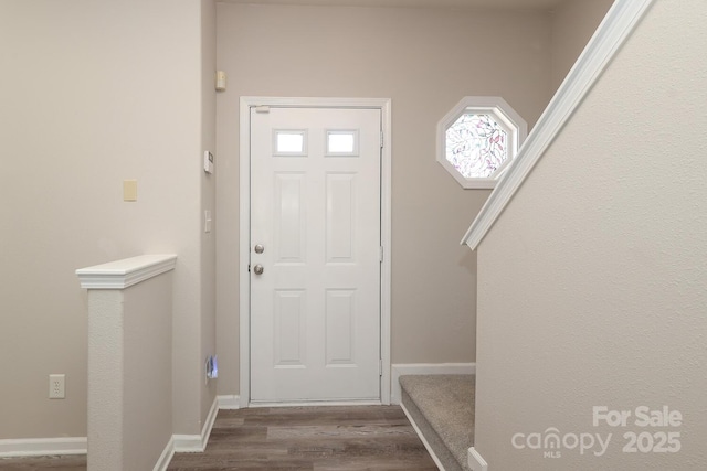 entrance foyer featuring hardwood / wood-style floors