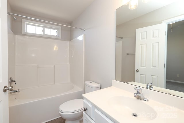 full bathroom featuring bathing tub / shower combination, vanity, and toilet