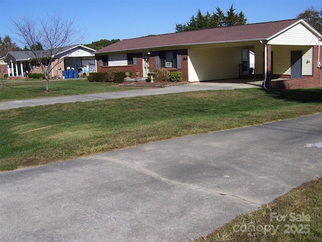 single story home featuring a carport and a front yard