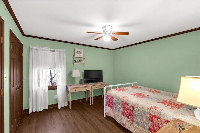 bedroom with crown molding, dark hardwood / wood-style floors, and ceiling fan