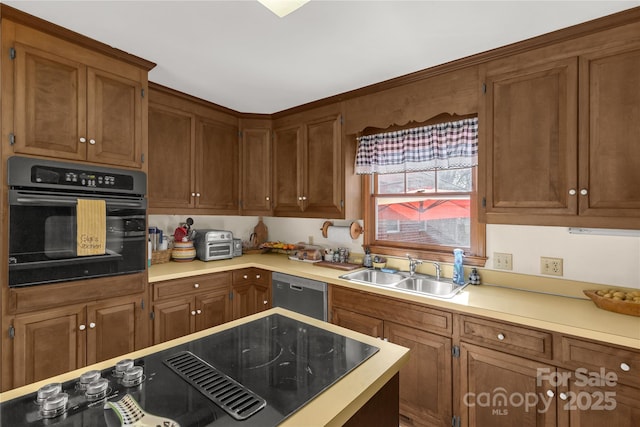 kitchen featuring sink and black appliances