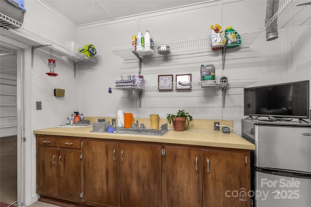 kitchen with stainless steel fridge