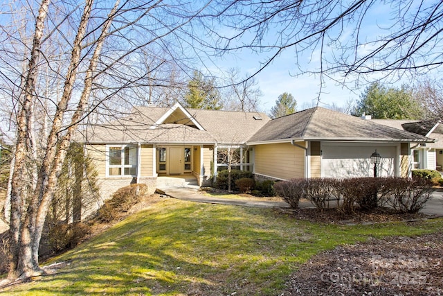 single story home with a front yard