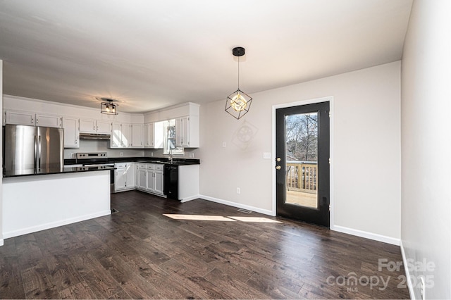 kitchen featuring white cabinetry, pendant lighting, dark hardwood / wood-style flooring, and stainless steel appliances