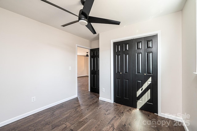 entryway featuring ceiling fan and dark hardwood / wood-style flooring