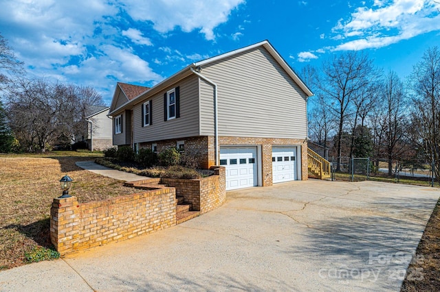 view of property exterior featuring a garage