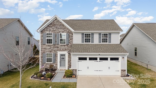 view of front of property featuring stone siding, a front lawn, roof with shingles, and driveway