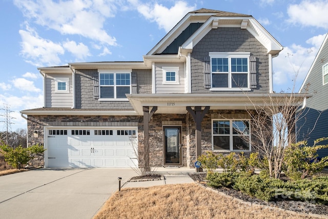 craftsman house featuring a garage