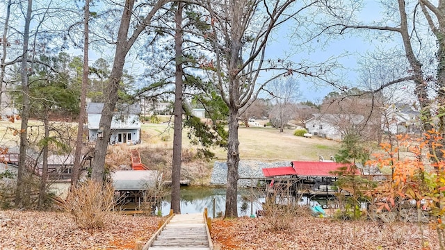 view of dock with a water view