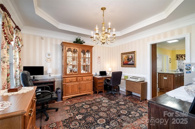 office area with a chandelier and wallpapered walls