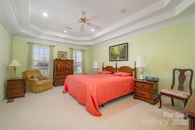 carpeted bedroom featuring visible vents, a raised ceiling, ceiling fan, crown molding, and recessed lighting