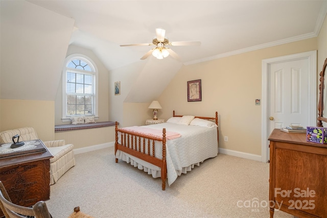 bedroom with crown molding, a ceiling fan, light carpet, vaulted ceiling, and baseboards