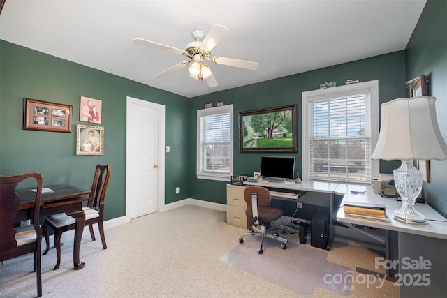 office with a wealth of natural light, carpet, ceiling fan, and baseboards