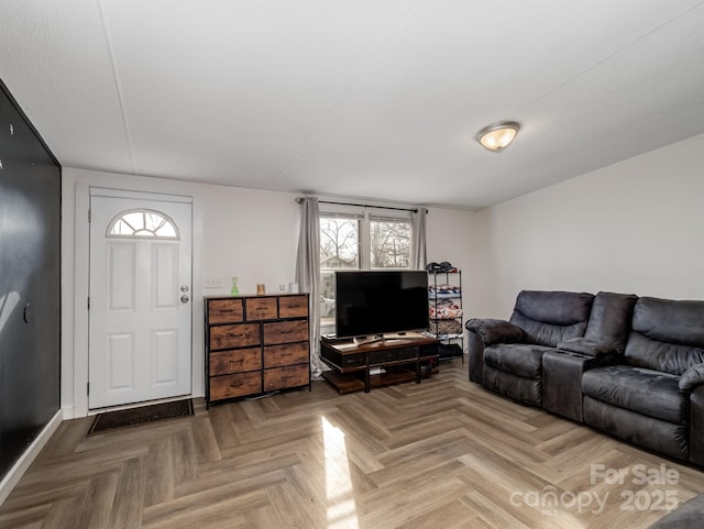 living room with parquet flooring