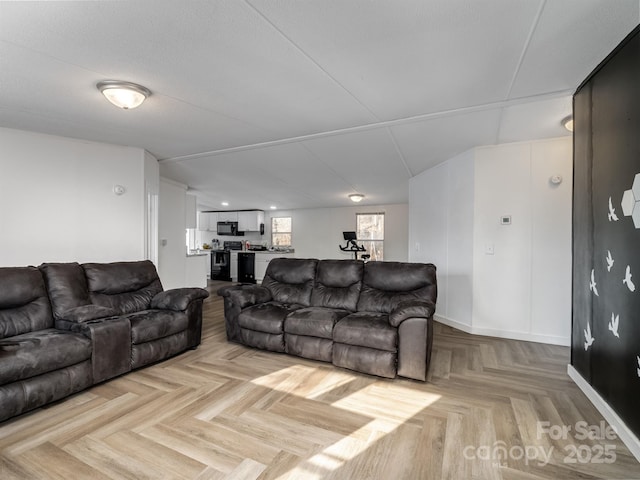 living room featuring light parquet flooring