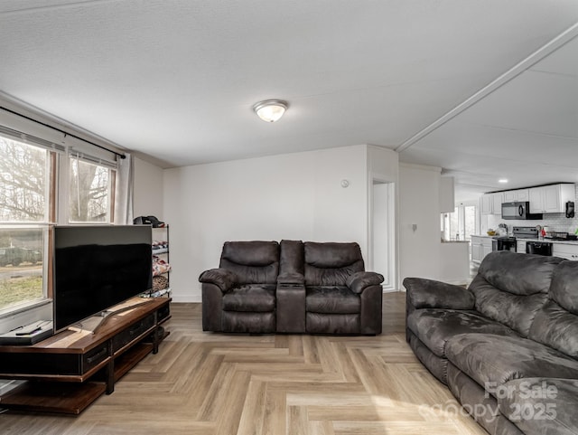 living room with light parquet floors