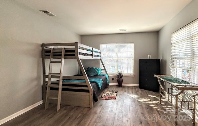 bedroom featuring dark hardwood / wood-style floors