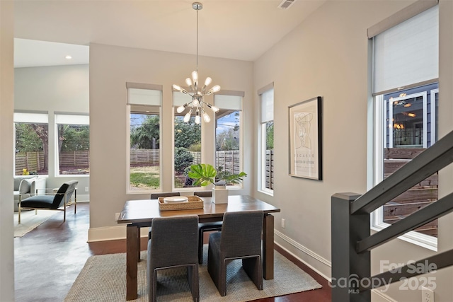 dining area featuring a chandelier