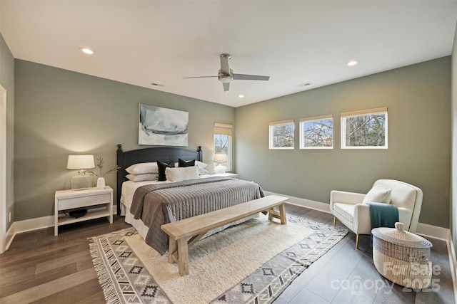 bedroom with hardwood / wood-style floors and ceiling fan