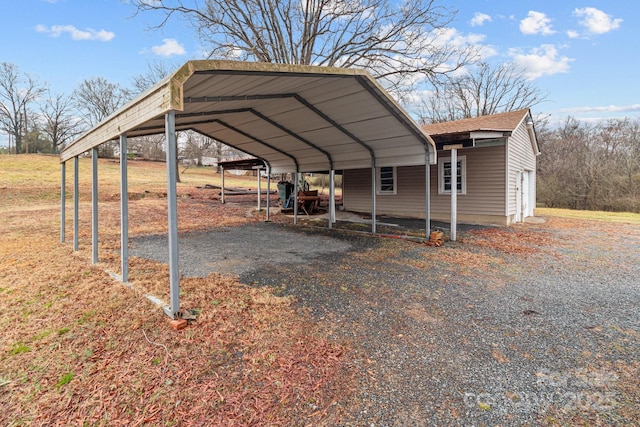 view of car parking featuring a carport