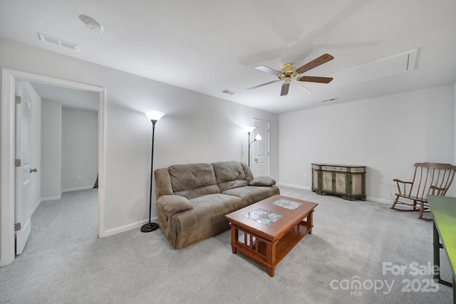 living room with ceiling fan and light carpet