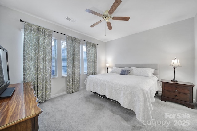 bedroom with light colored carpet and ceiling fan