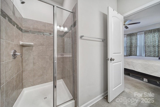 bathroom with tile patterned flooring, ceiling fan, and walk in shower