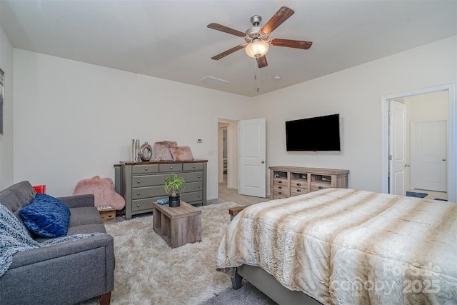 carpeted bedroom featuring ceiling fan