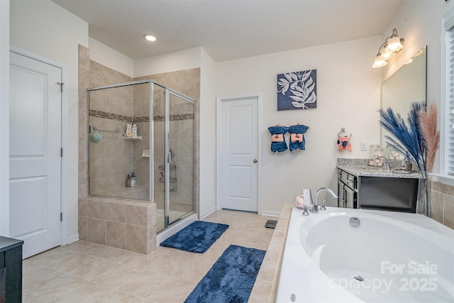 bathroom with vanity, tile patterned floors, and shower with separate bathtub