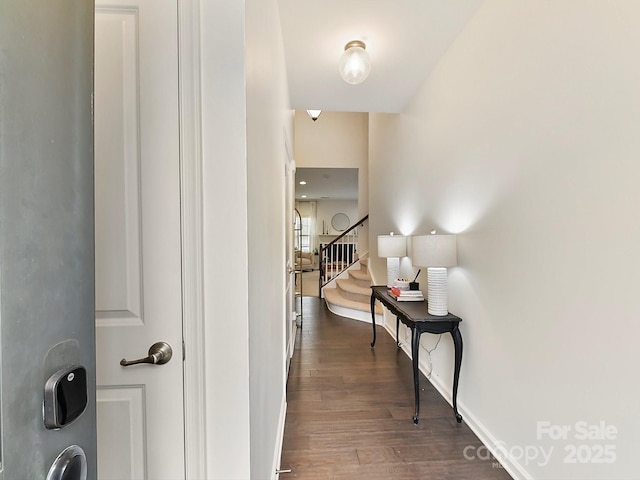 hall with dark hardwood / wood-style floors