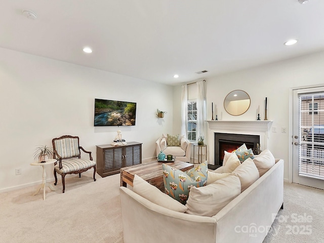 living room featuring light carpet