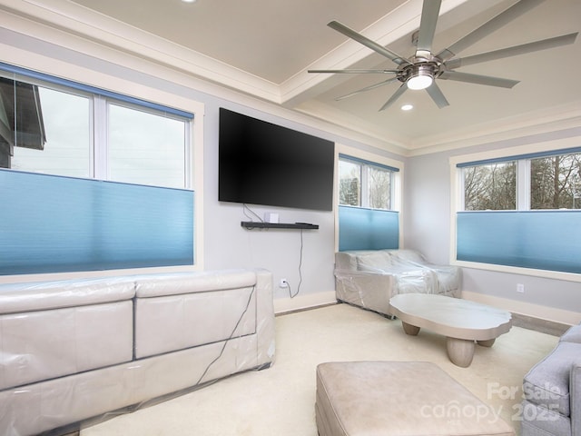 bedroom featuring crown molding, light carpet, and ceiling fan