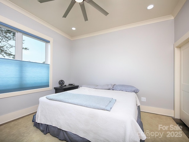 bedroom with crown molding, light colored carpet, and ceiling fan