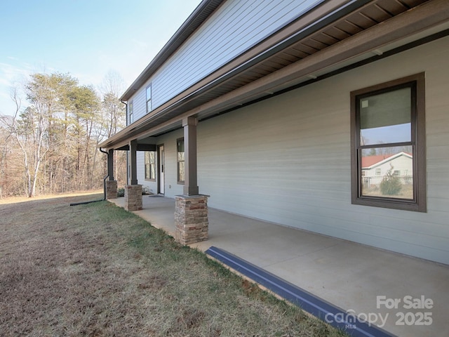 view of home's exterior featuring a patio area