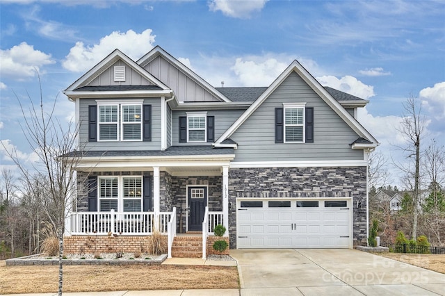 craftsman-style house with a garage and covered porch