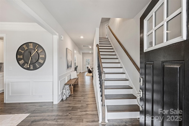 foyer featuring dark hardwood / wood-style floors