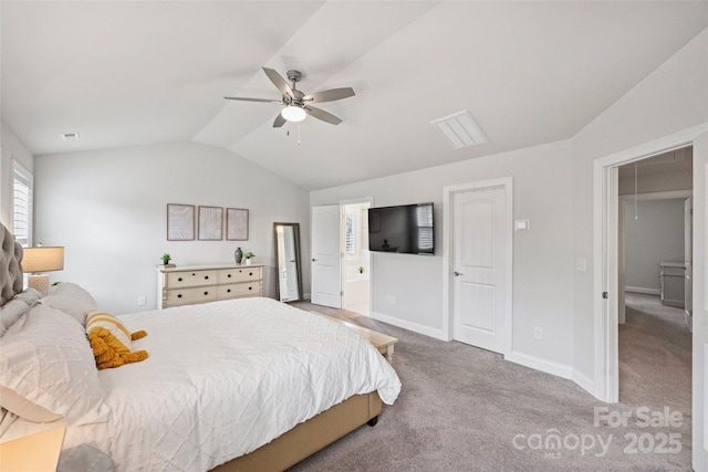 carpeted bedroom featuring lofted ceiling and ceiling fan