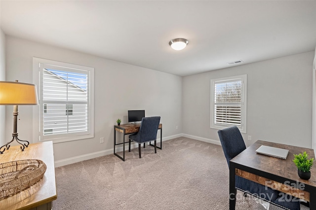 view of carpeted office space